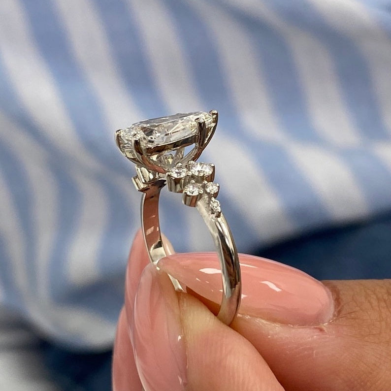 Stunning 1.50 CT Pear Moissanite Engagement Ring with Cluster Design 2