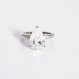 Stunning 3.0 CT Pear Cut Moissanite Engagement Ring with Pave Design 1