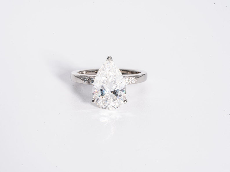 Stunning 3.0 CT Pear Cut Moissanite Engagement Ring with Pave Design 1