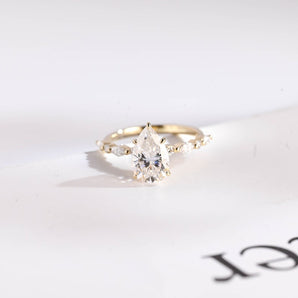 Stunning 1.0 - 2.0 CT Pear Moissanite Engagement Ring with Half Pave Design