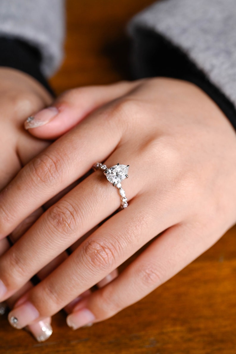 Stunning 1.0 - 2.0 CT Pear Moissanite Engagement Ring with Pave Design 8