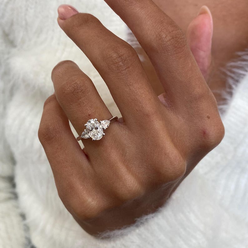Stunning 1.0 CT Oval Moissanite Engagement Ring with Three Stone Design 8