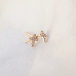0.20 TCW Round Cut Moissanite Cross Stud Earrings in Gold 3
