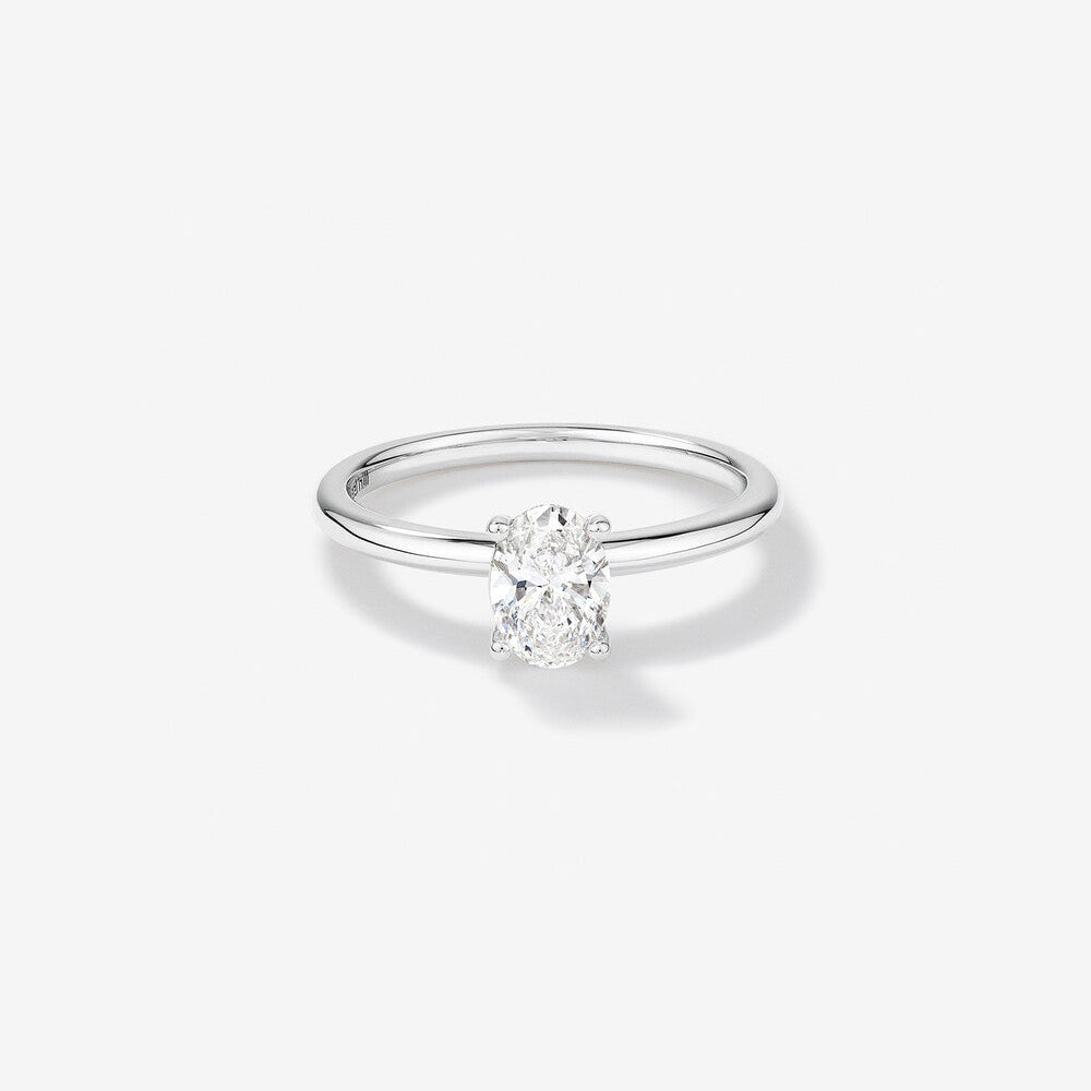 Stunning 0.70 CT Oval Moissanite Engagement Ring Solitaire Design 1