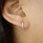 Stunning 0.50 TCW Round Cut Moissanite Huggies Earrings In Gold 3
