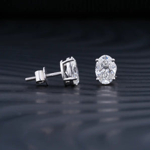 2.0 TCW Oval Cut Moissanite Stud Earrings in Gold