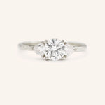 Stunning 1 CT Round Moissanite Engagement Ring With Three Stone Design 4