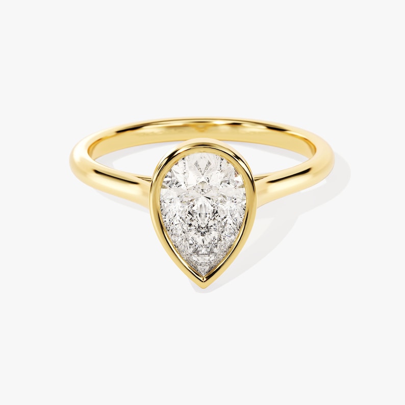Stunning 1.0-2.0 CT Pear Moissanite Engagement Ring with Dainty Design 1