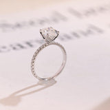Stunning 1.0 - 2.0 CT Pear Moissanite Engagement Ring with Pave Design 9