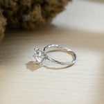 Stunning 1.0 CT Round Moissanite Engagement Ring with Twisted Shank in Solitaire Design 4