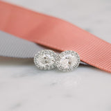 1.50 TCW Oval Shape Moissanite Halo Stud Earrings in Gold 1