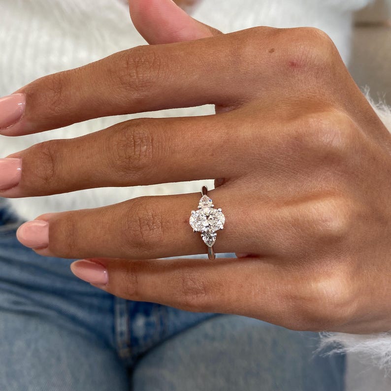 Stunning 1.0 CT Oval Moissanite Engagement Ring with Three Stone Design 6