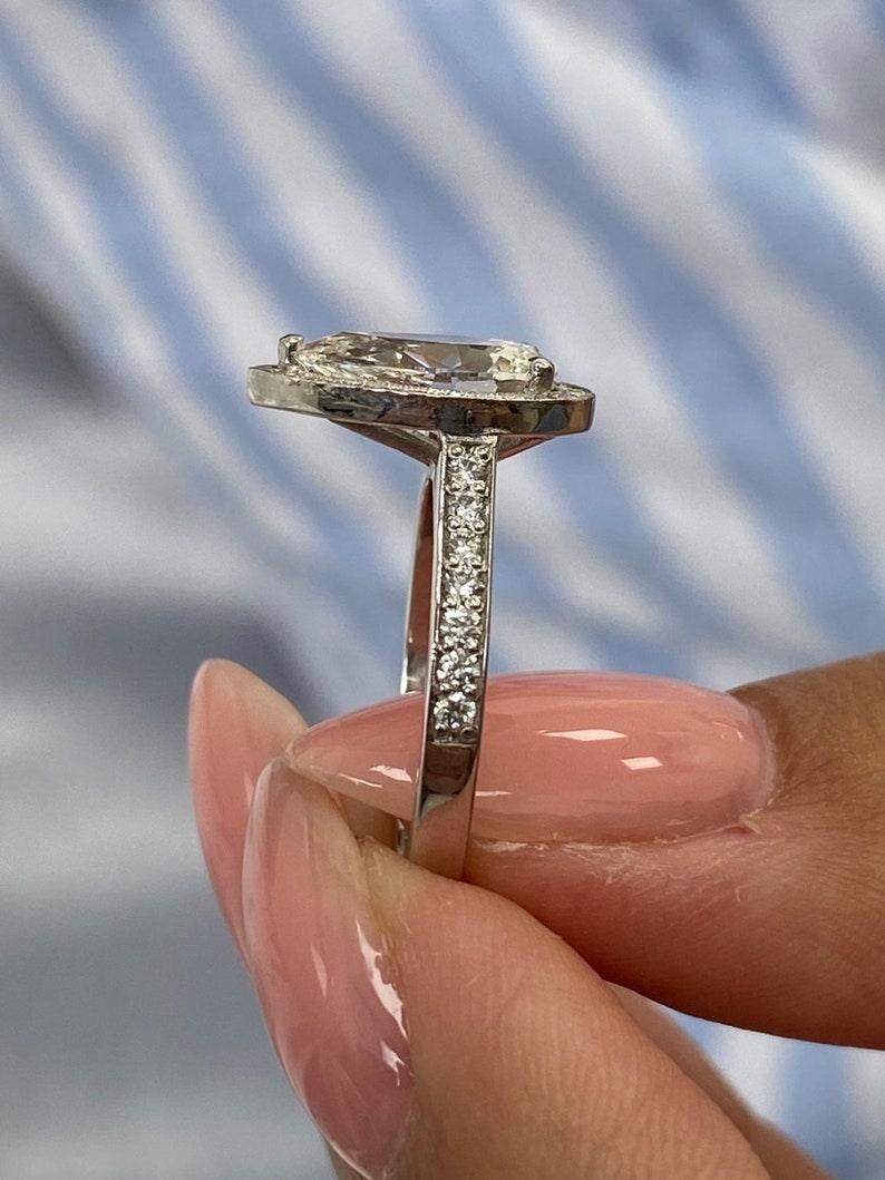Stunning 1.75 CT Pear Moissanite Engagement Ring with Halo & Pave Design 3
