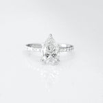 Stunning 2.0 CT Pear Moissanite Engagement Ring with Hidden Halo & Pave Design 1