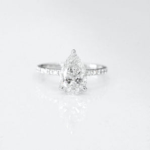 Stunning 2.0 CT Pear Moissanite Engagement Ring with Hidden Halo & Pave Design