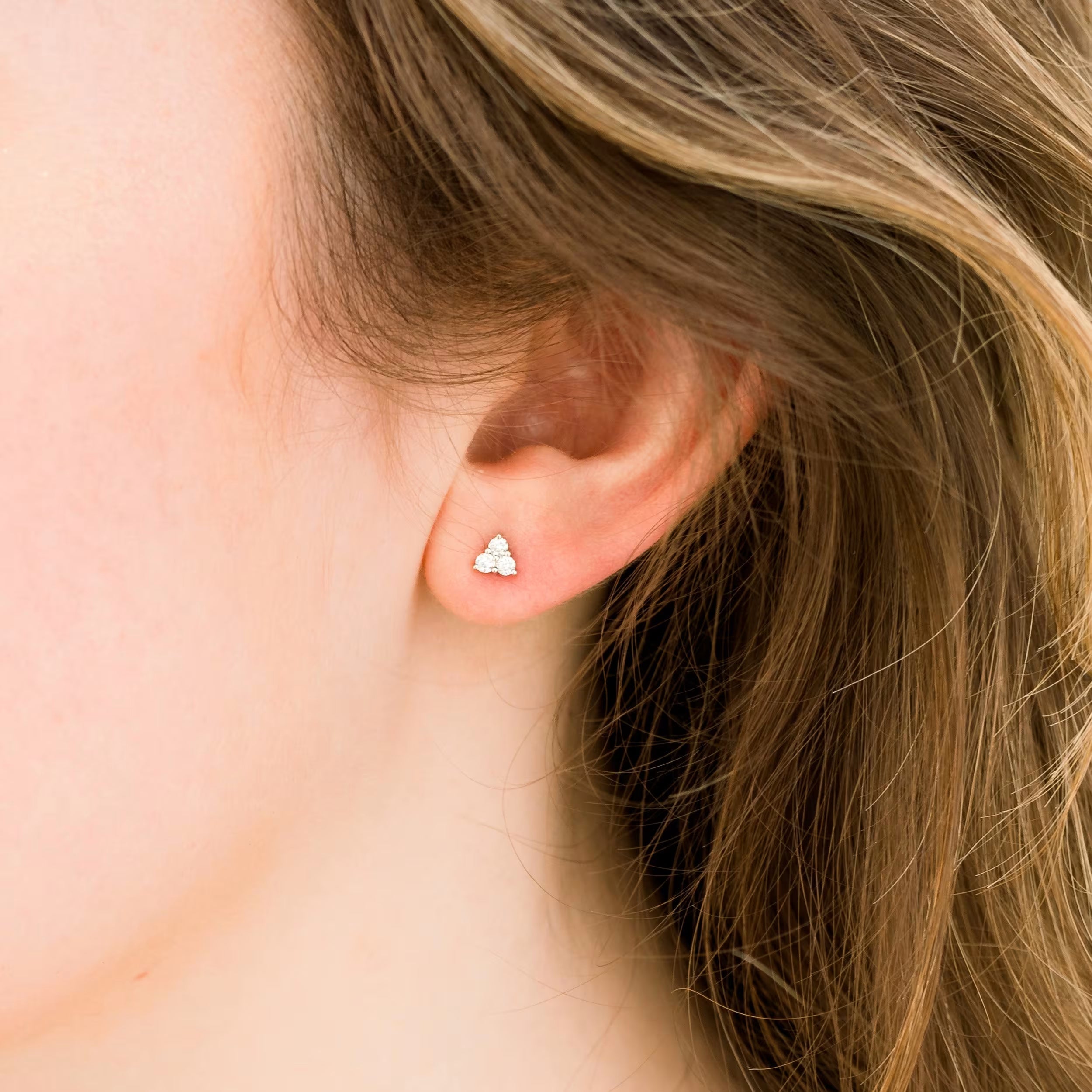 0.30 TCW Round Cut Moissanite Three Stone Stud Earrings in Gold 4