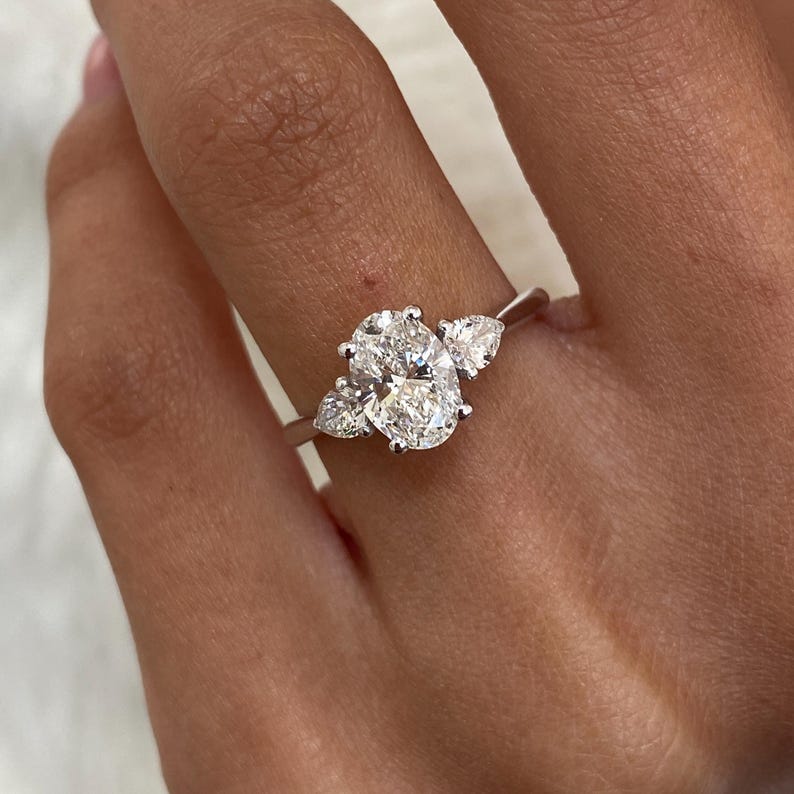 Stunning 1.0 CT Oval Moissanite Engagement Ring with Three Stone Design 9