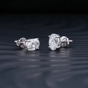 2.0 TCW Oval Cut Moissanite Stud Earrings in Gold