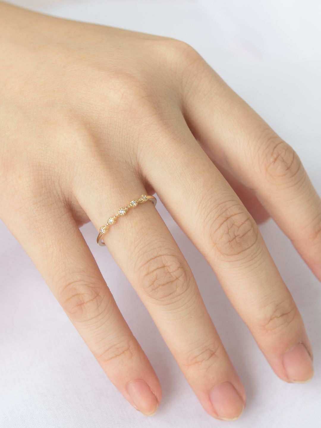 Stunning 0.2 TCW Round Moissanite Stones 5 Stones Wedding Bands 11