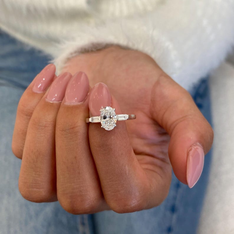 Stunning 1.0 CT Oval Moissanite Engagement Ring in Three stones Design 3