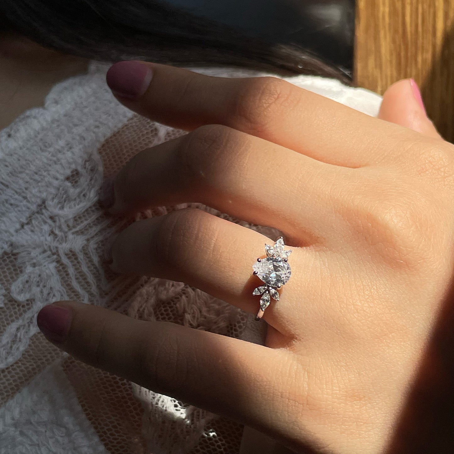 Stunning 1.50 CT Pear Moissanite Engagement Ring with Cluster Design 1