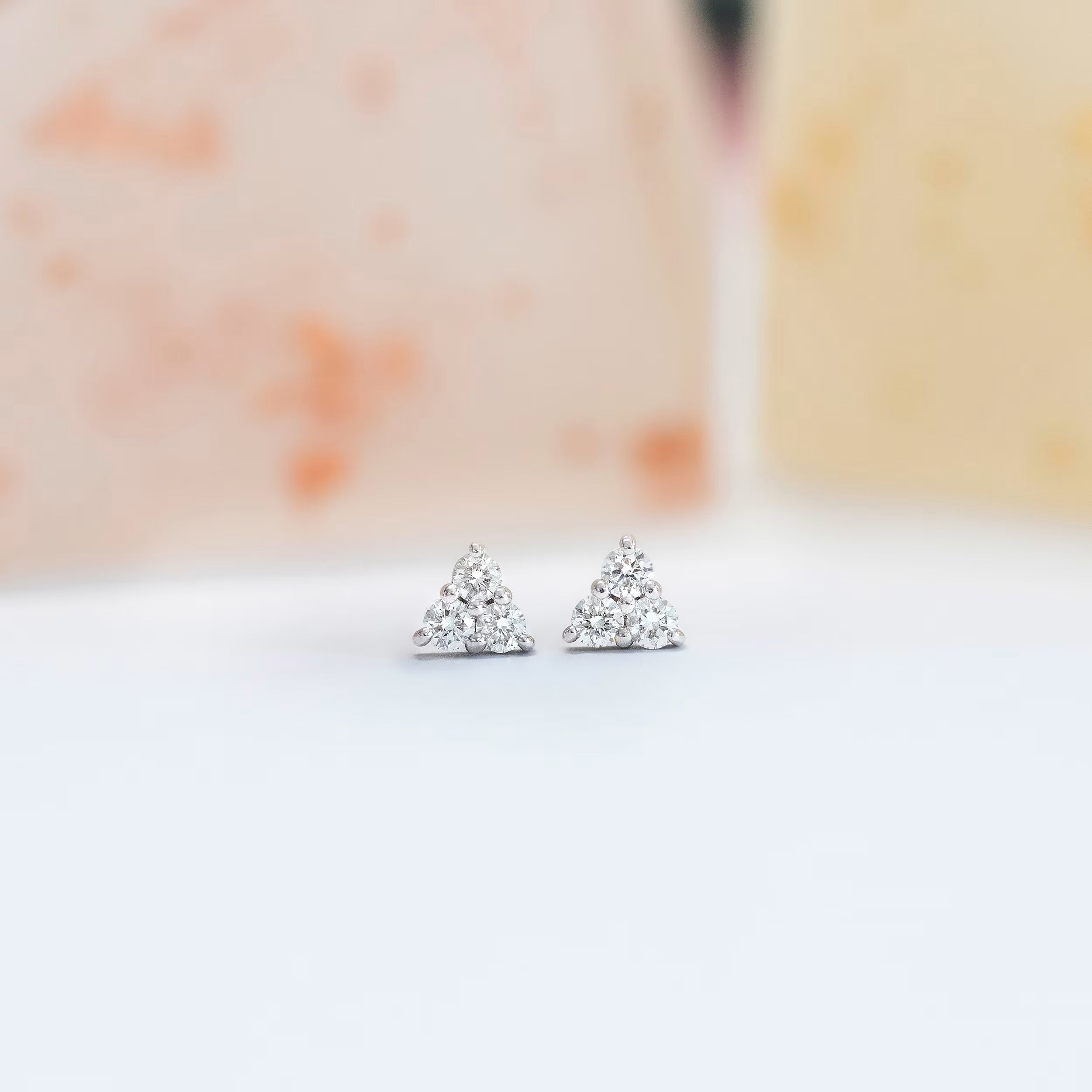0.30 TCW Round Cut Moissanite Three Stone Stud Earrings in Gold 2
