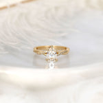 Stunning 1.50 CT Pear Moissanite Engagement Ring with Twisted Pave Design 1