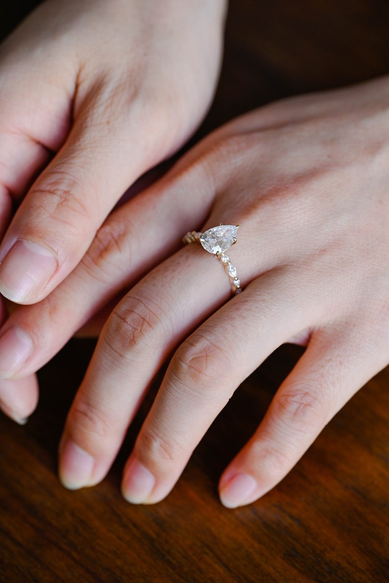 Stunning 1.0 - 2.0 CT Pear Moissanite Engagement Ring with Half Pave Design 4