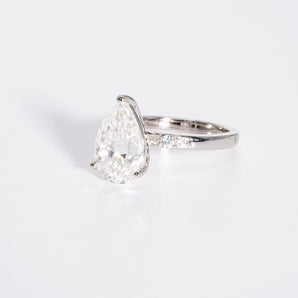 Stunning 3.0 CT Pear Cut Moissanite Engagement Ring with Pave Design