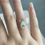 Stunning 3.0 CT Pear Moissanite Engagement Ring with Halo & Pave Design 6