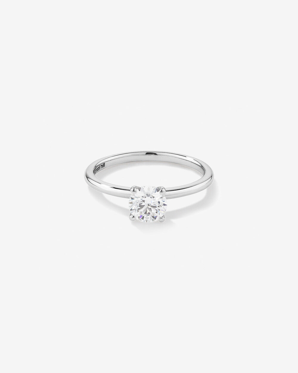 Stunning 0.7 CT Round Moissanite Solitaire Design Engagement Ring 1