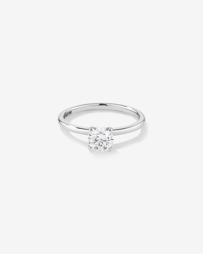Stunning 0.7 CT Round Moissanite Solitaire Design Engagement Ring 1
