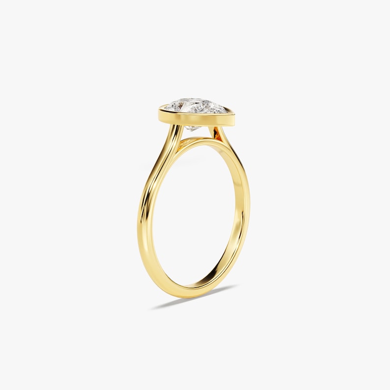 Stunning 1.0-2.0 CT Pear Moissanite Engagement Ring with Dainty Design 2