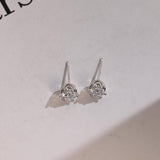 0.70 TCW Round Cut Moissanite Stud Earrings in Gold 9