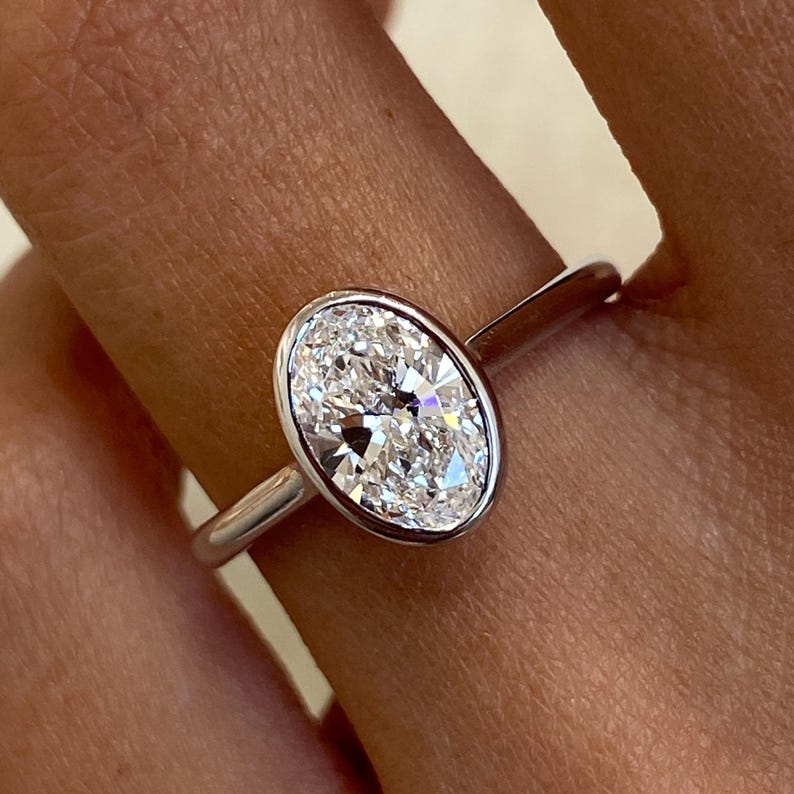 Stunning 1.0 CT Oval Moissanite Engagement Ring in Bezel Design 9