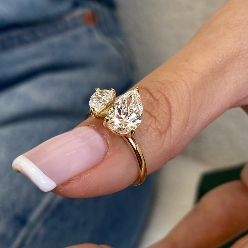 Stunning 1.50 CT Pear Moissanite Engagement Ring with Two Stone Design 4