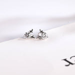 0.70 TCW Round Cut Moissanite Stud Earrings in Gold 1