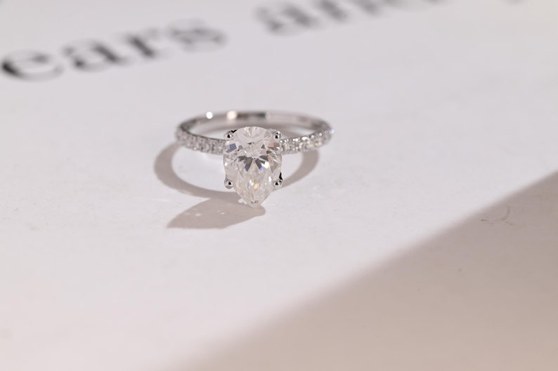 Stunning 1.0 - 2.0 CT Pear Moissanite Engagement Ring with Pave Design 1