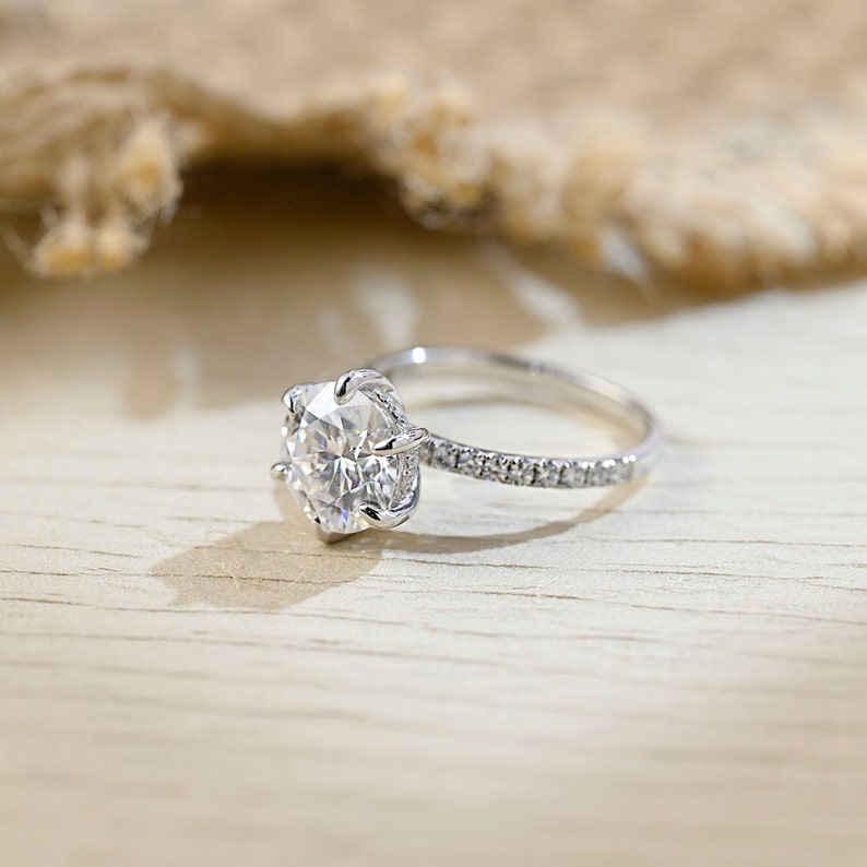 
                  
                    3.5 CT Round Shaped Moissanite Engagement Ring With Hidden Halo Pave Accents
                  
                