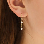 0.50 TCW Round Cut Moissanite Bezel Dangle Earrings in Gold 5