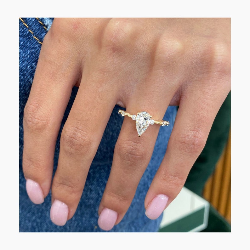Stunning 1.0 CT Pear Moissanite Engagement Ring with Dainty Pave Design 4