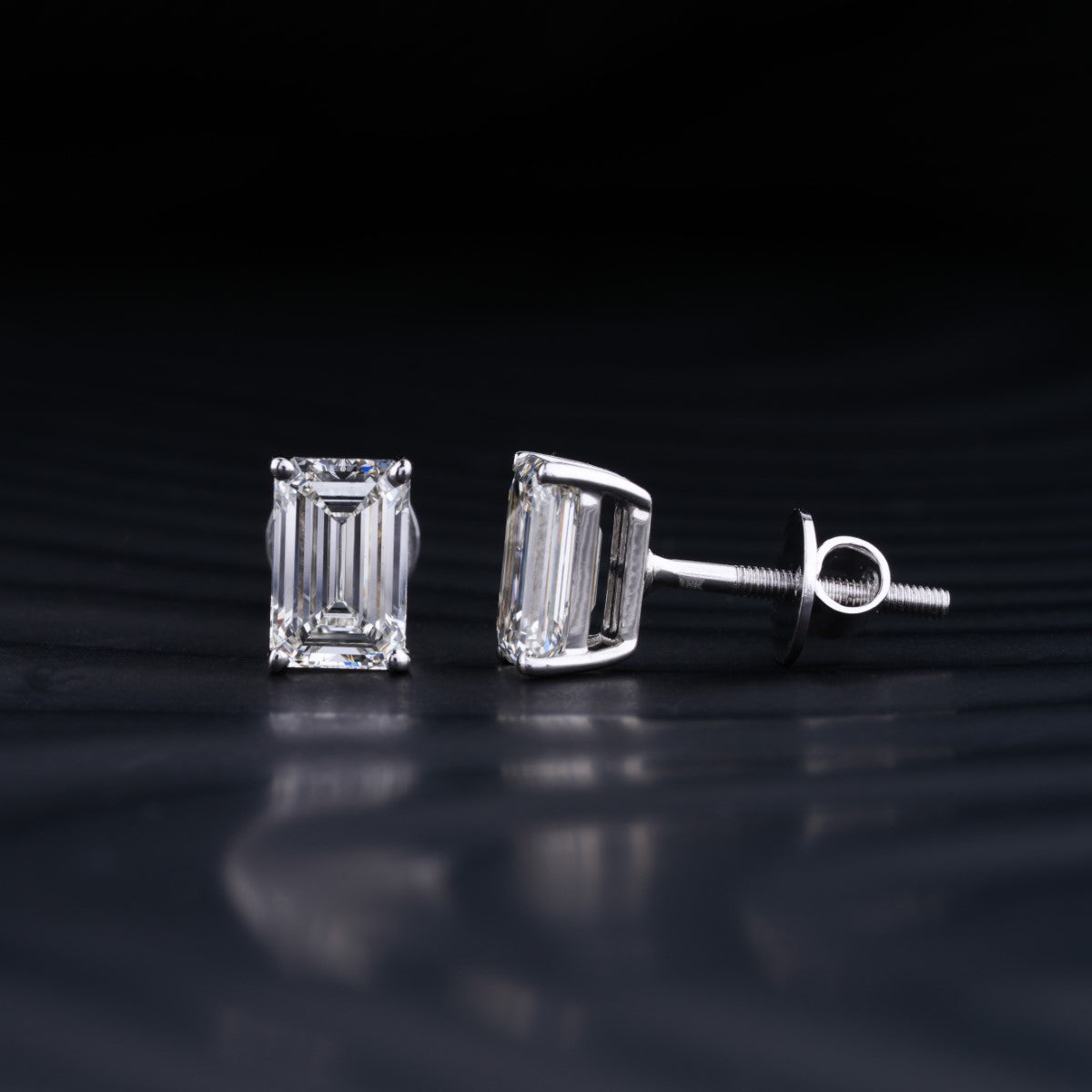 2.0 TCW Emerald Cut Moissanite Stud Earrings in Gold 3