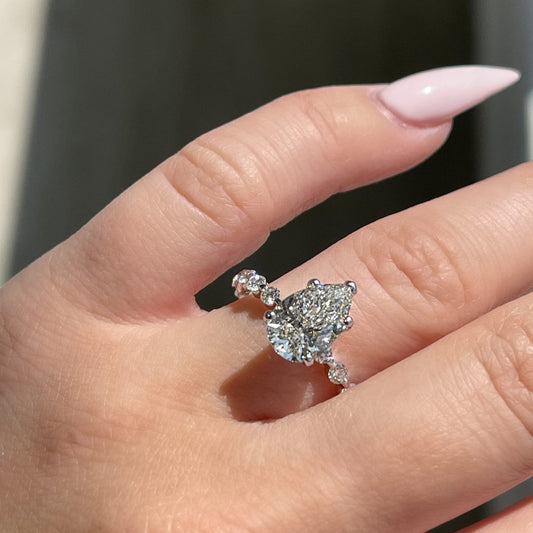 Stunning 2.0 CT Pear Moissanite Engagement Ring with Dainty Pave Design 1