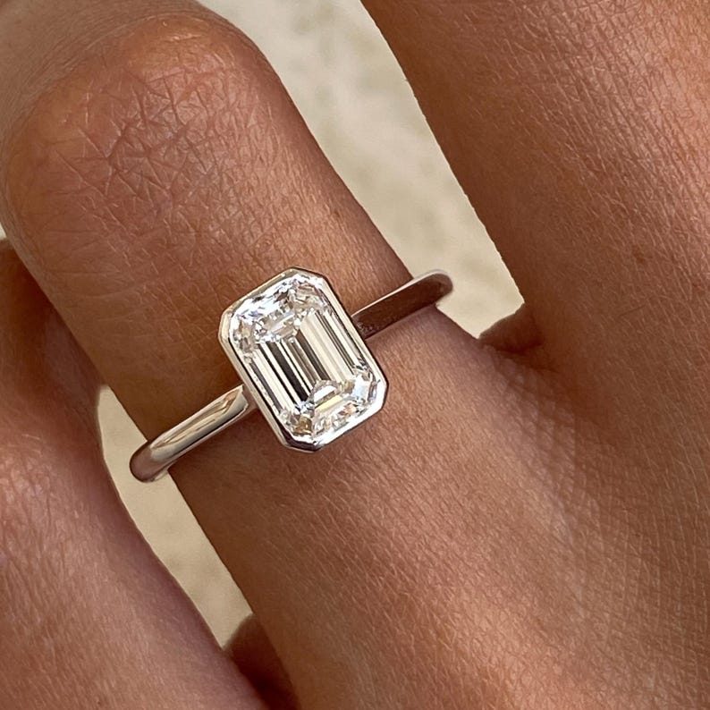 Stunning 1.0 CT Emerald Moissanite Engagement Ring with Bezel Design 4
