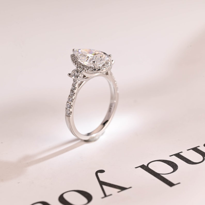 Stunning 1.0 - 2.0 CT Pear Moissanite Engagement Ring with Pave & Halo Design 10