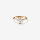 Stunning 1.25 CT Pear Moissanite Engagement Ring with Bezel Design 1