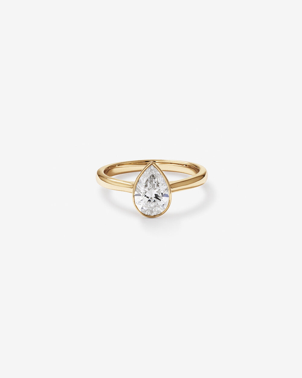 Stunning 1.25 CT Pear Moissanite Engagement Ring with Bezel Design 1