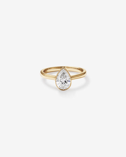 Stunning 1.25 CT Pear Moissanite Engagement Ring with Bezel Design 1
