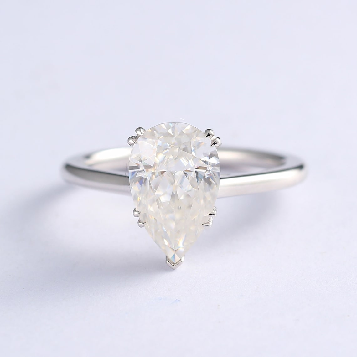 Hidden Halo Engagement Ring Featuring 3.23 CT Pear Moissanite 1