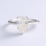 Hidden Halo Engagement Ring Featuring 3.23 CT Pear Moissanite 1